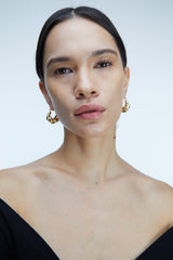 OVERSIZED CROISSANT HUGGIE EARRINGS