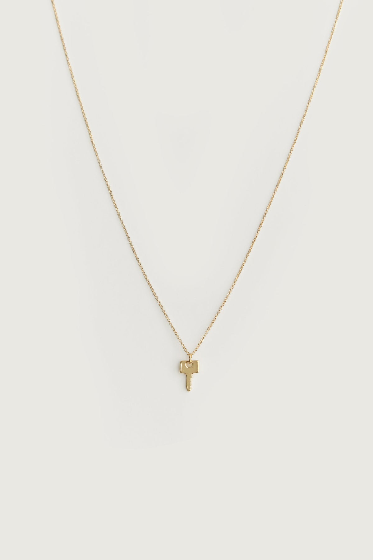 KEY CHARM NECKLACE